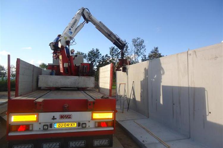 Plaatsing sleufsilowanden - Dam Beton