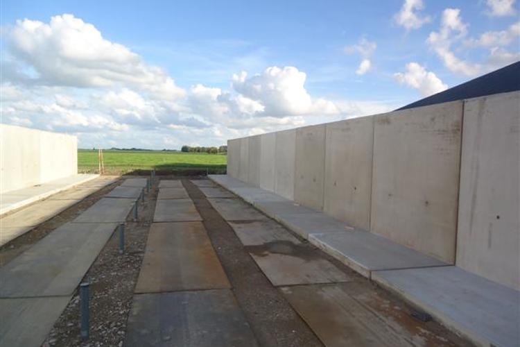 Plaatsing sleufsilowanden - Dam Beton